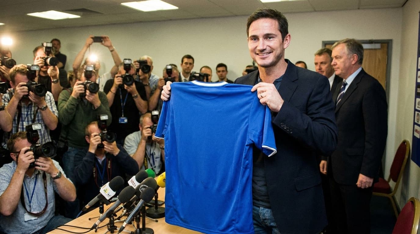 A footballer holding up a club shirt at a transfer unveiling