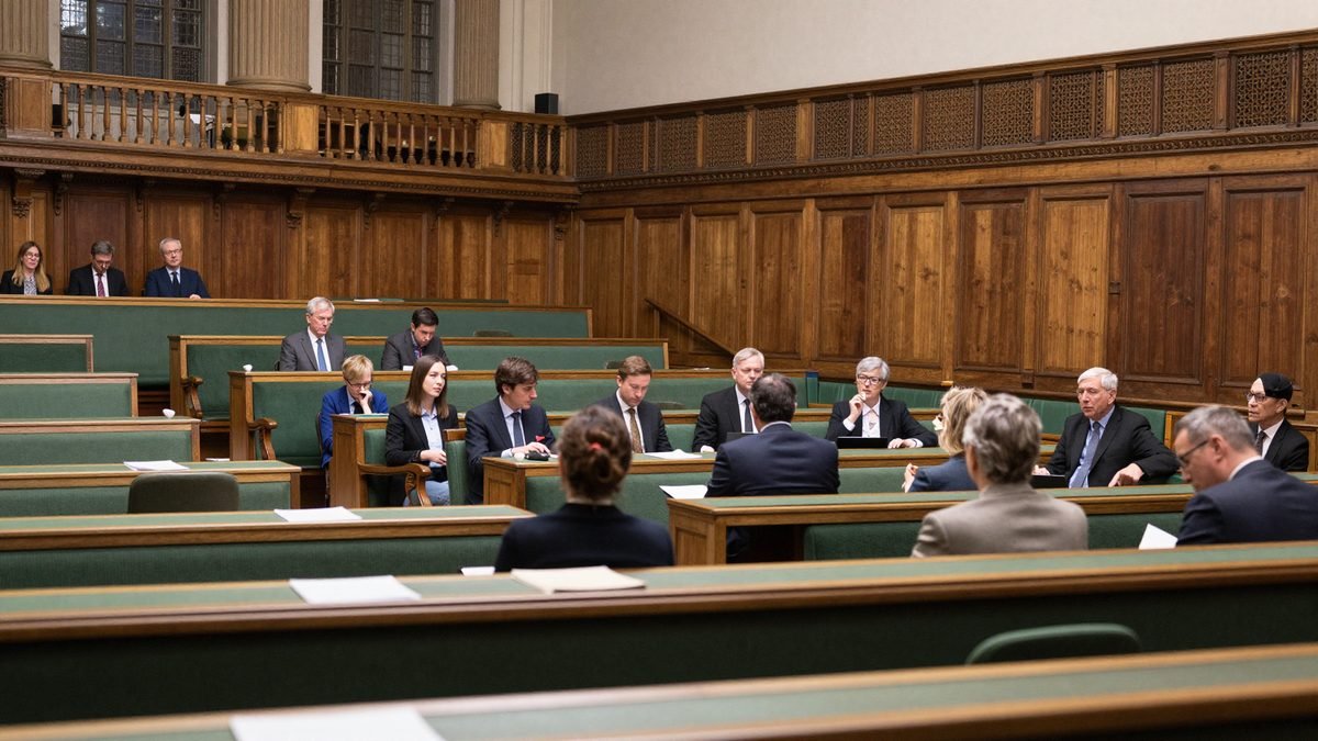The public gallery and green benches of a Westminster Hall debating chamber