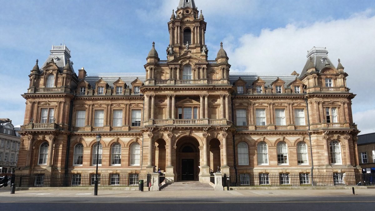 A grand Victorian city hall building in a northern English city
