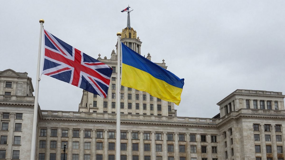 The UK and Ukrainian flags flying side by side outside a government building
